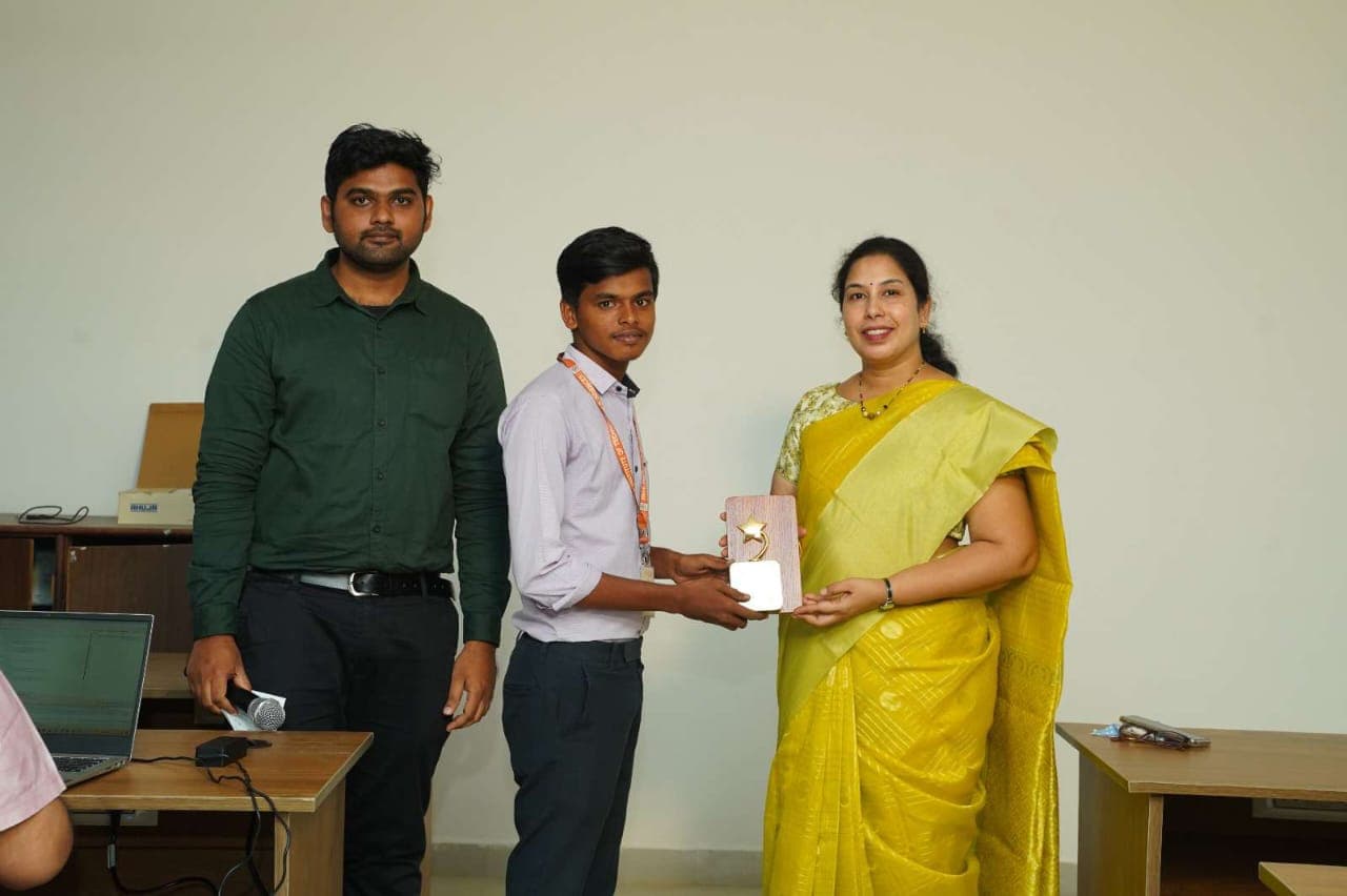 Revanth Kumar receiving 1st prize in AI/ML & Data Science Hackathon coding competition - Photo 1